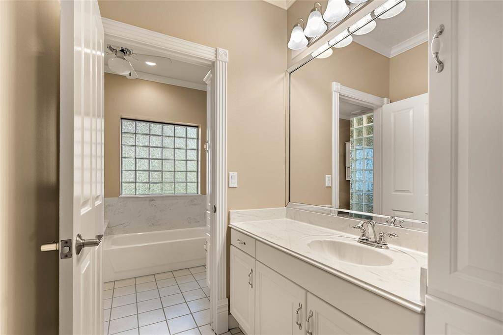 Full bath with a clean  look and updated fixtures.