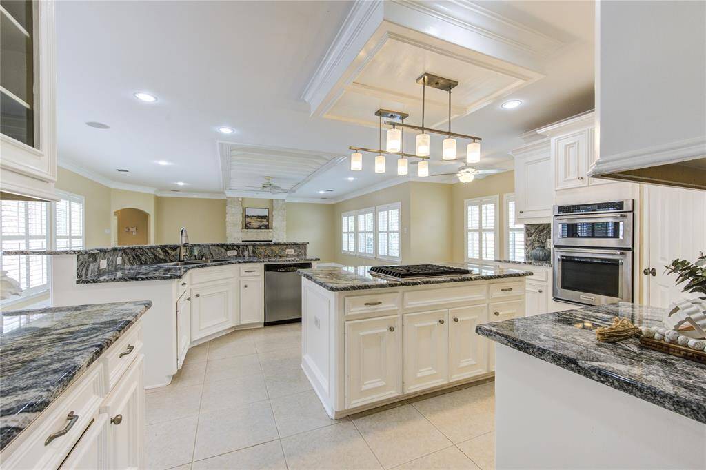 Don't miss what's going on in the living room while you're cooking - perfect for entertaining!