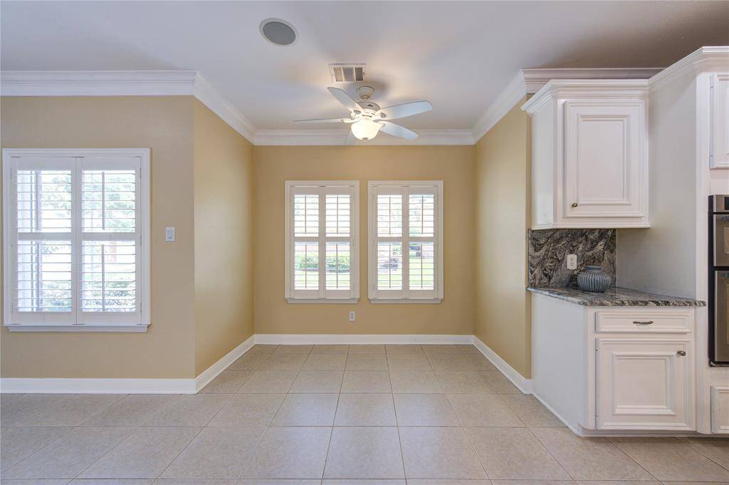 Bright and inviting, the breakfast area offers the perfect spot to start your day with natural light and cozy charm