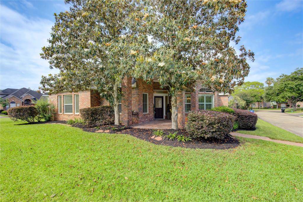 This home is surrounded by stunning, professionally designed landscaping, creating picturesque curb appeal that’s sure to impress.