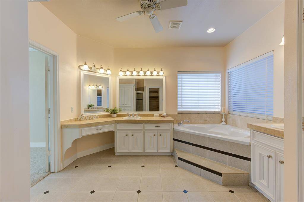 Get ready to forget about routine in this large jetted tub!