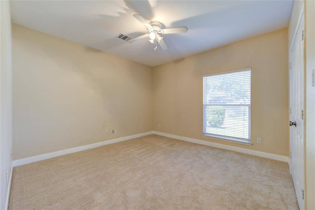 Retire to this charming bedroom and enjoy a quiet, delightful space all your own.
