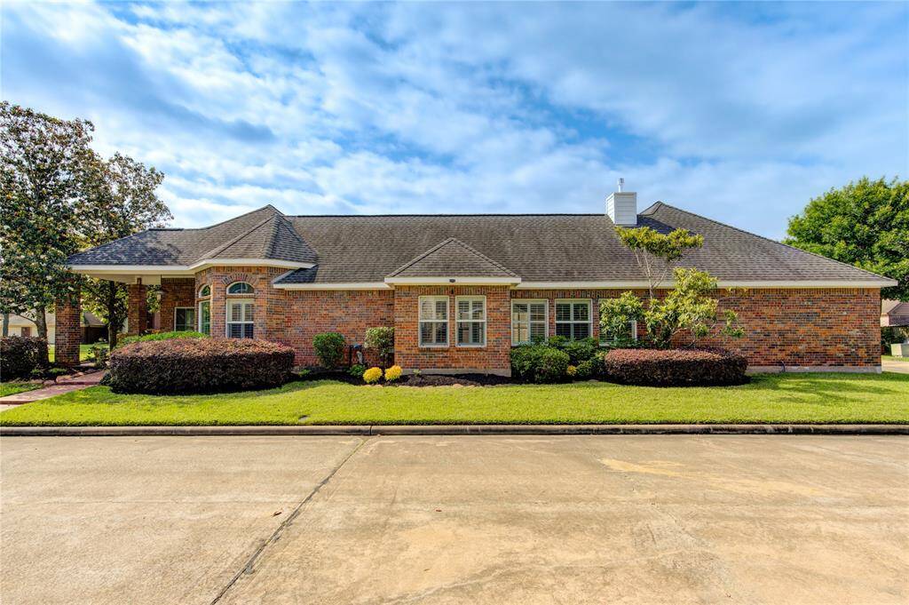 This house has lovely mature landscaping.
