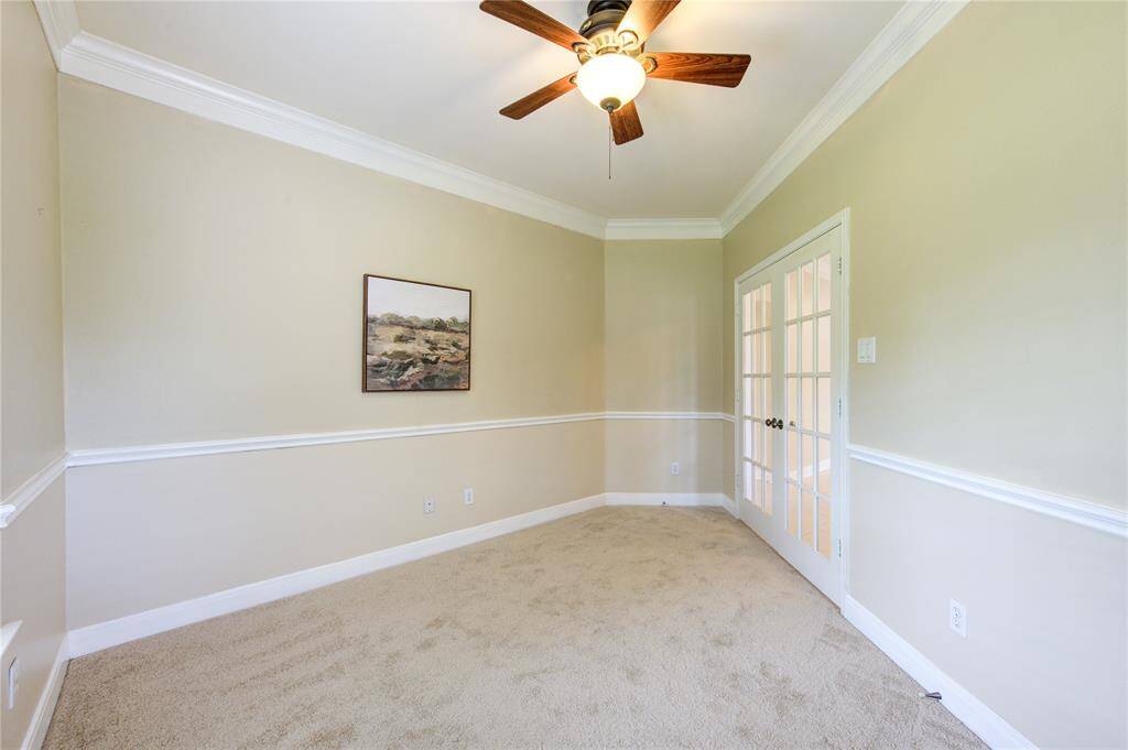Quiet and refined, the study offers a dedicated space for focus and productivity, complete with ample natural light.