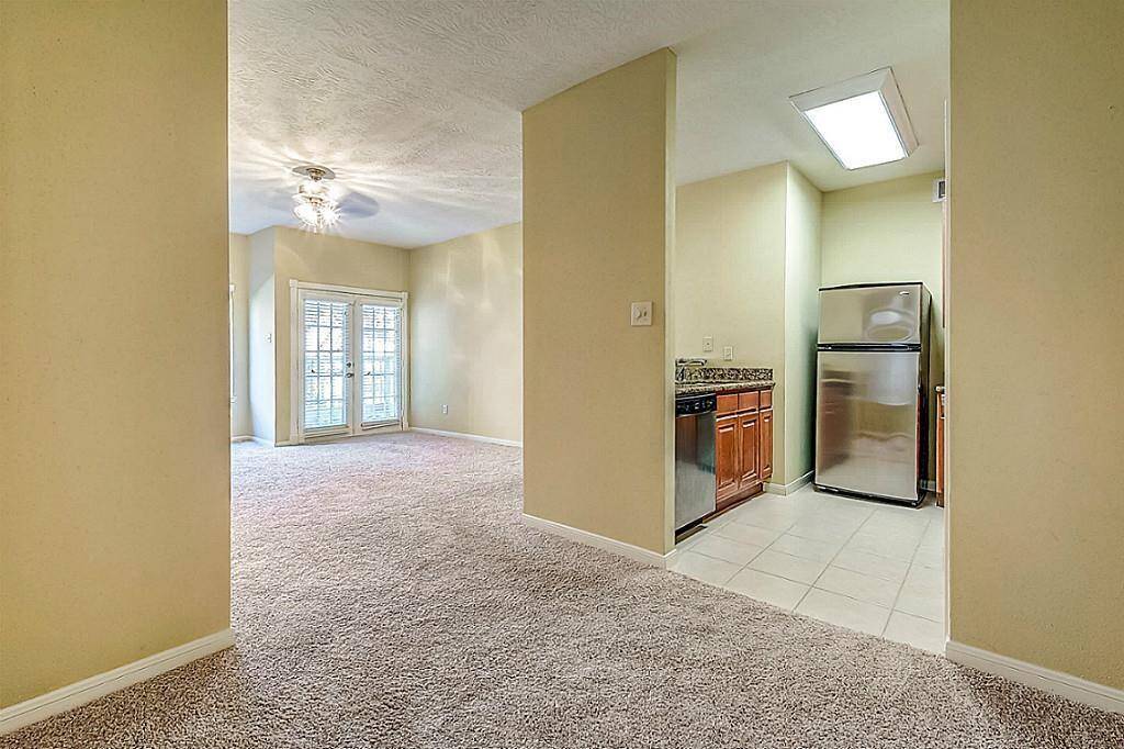 Spacious, Light & Bright Living Room with large window and French Door to Patio - BEFORE