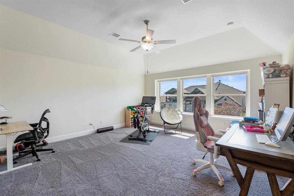 Game room upstairs also has nice high ceilings and lots of room and light.