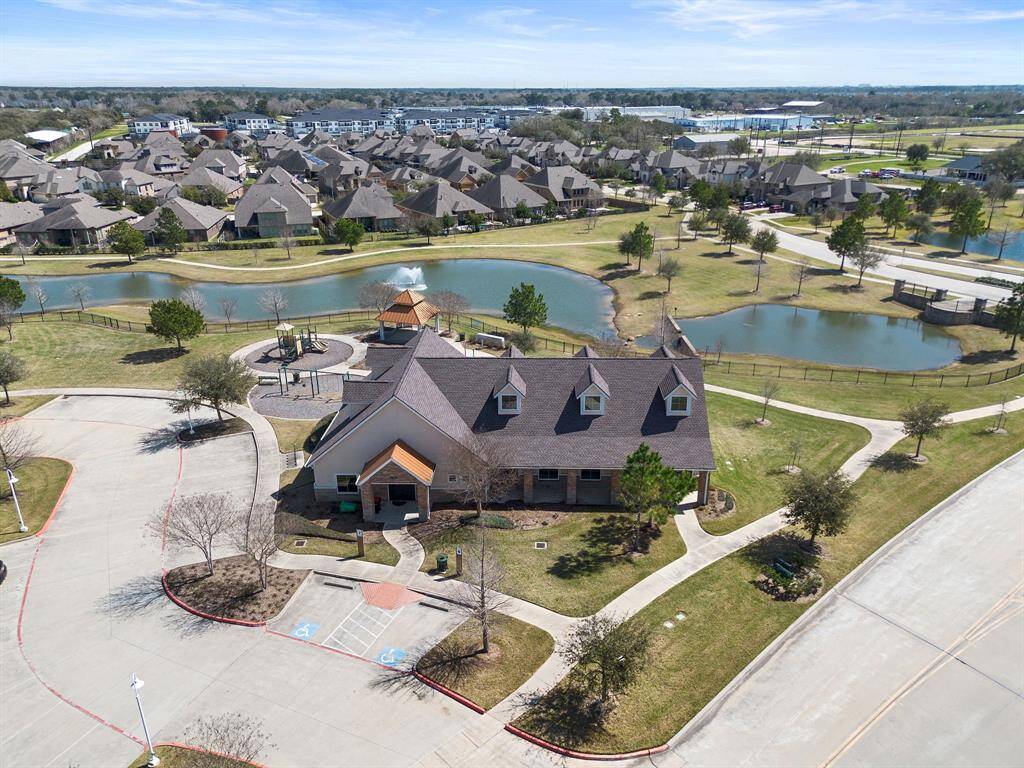 Another viewpoint of playground, pavilion and clubhouse amenities.