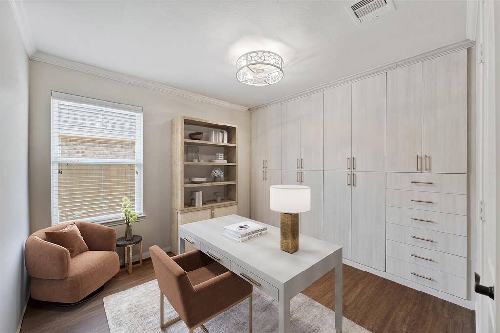 Second bedroom staged as an office. Virtually Staged.