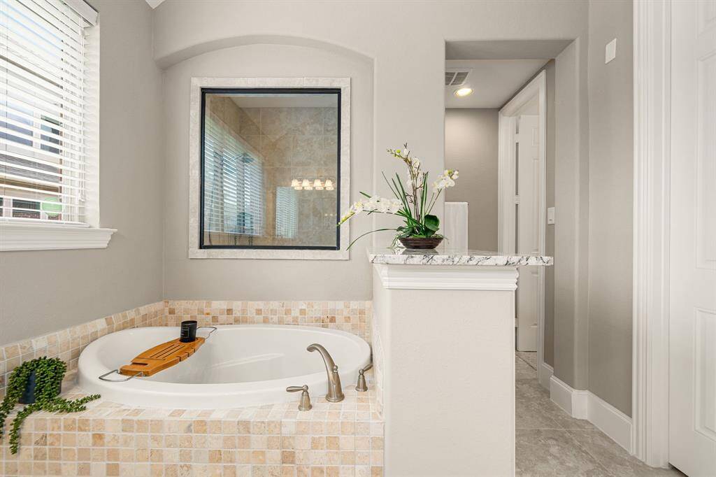 5 ft Soaking Garden Tub with Extra Cabinetry for Linen Storage