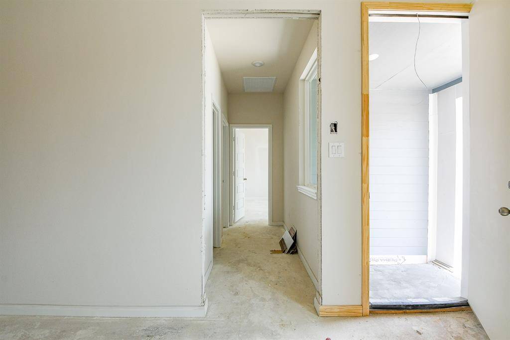 The hallway leads to the rooms.