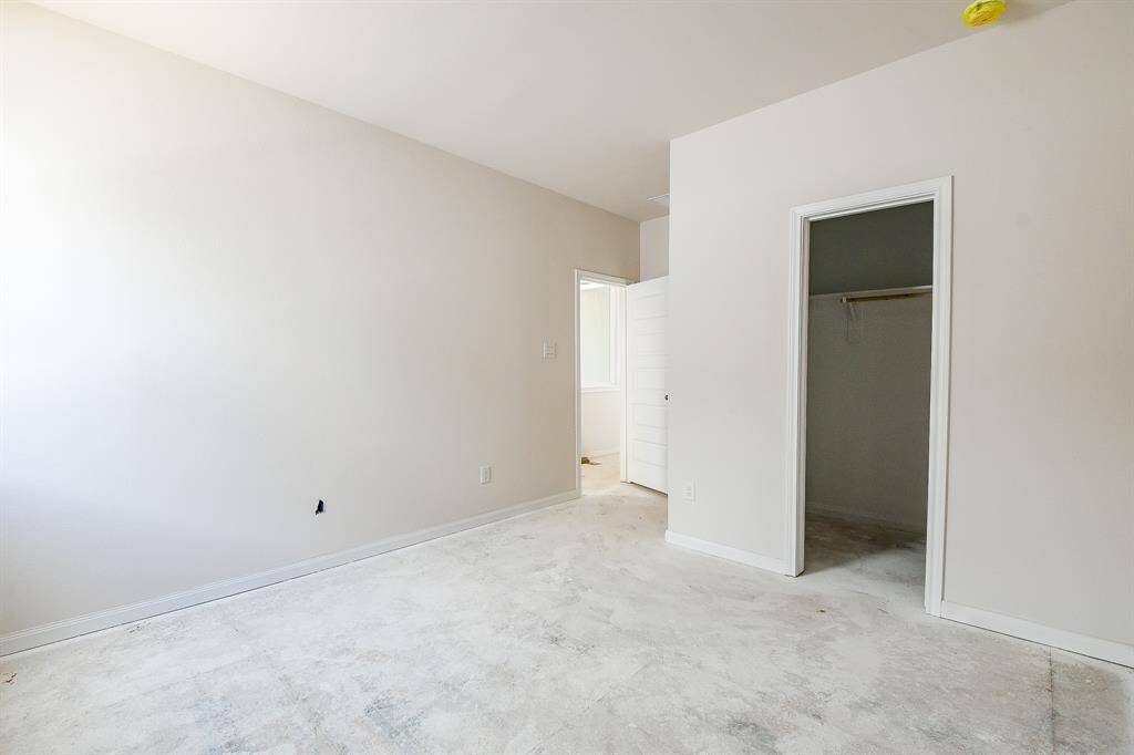 Step into this spacious guest room.