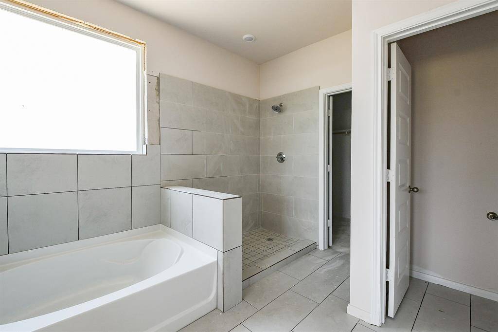 This soaking tub is perfect for relaxation, and the shower is great for getting ready on the go.