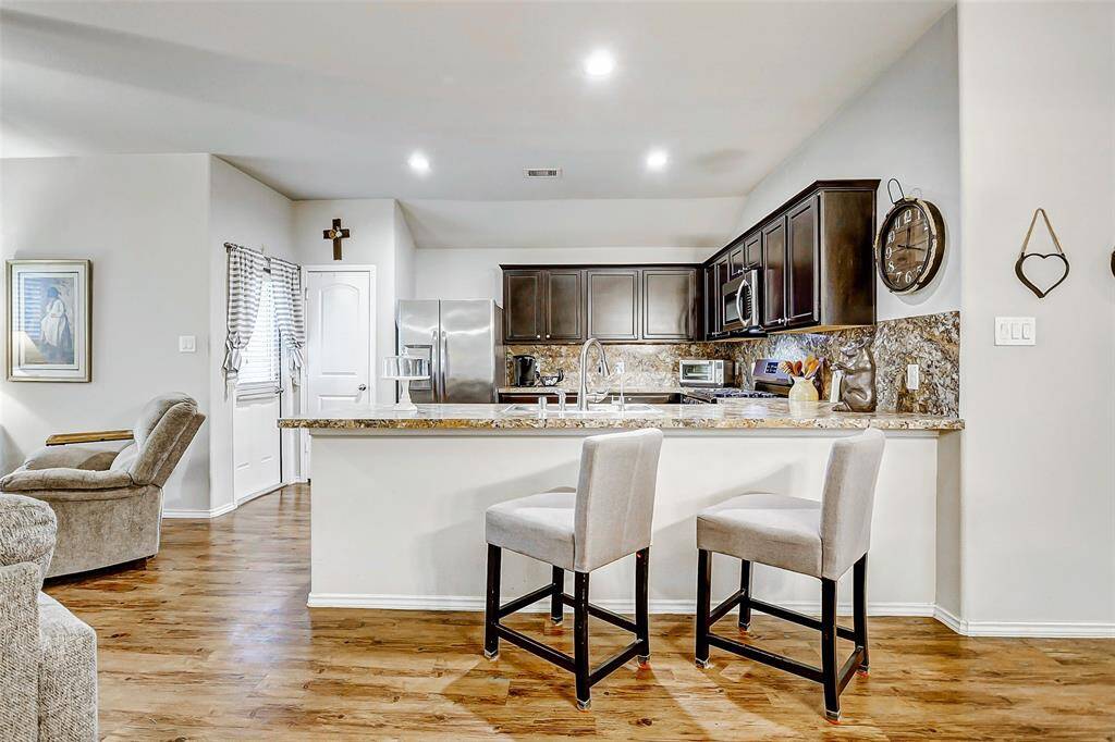 A beautifully appointed kitchen effortlessly blends style and functionality.