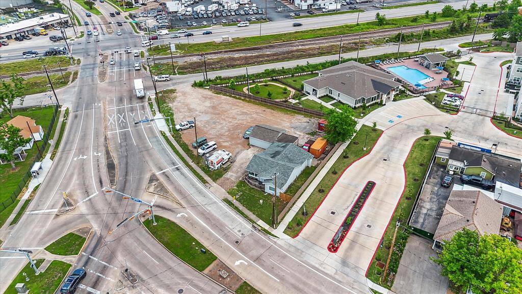 Aerial shot of 2106 and 2110 Antoine Drive, highlighting the property layout.