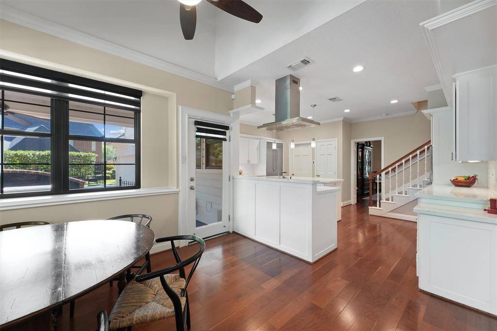 Breakfast room with view to the kitchen.  Look at those hardwood floors!