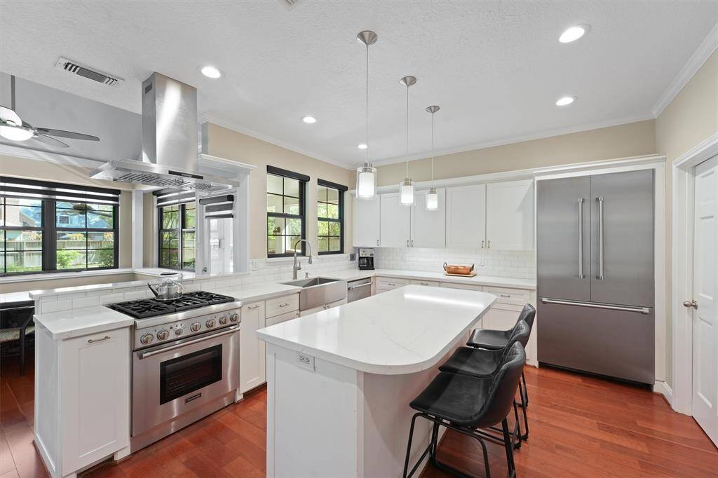 Thermador appliances and quartz counters.