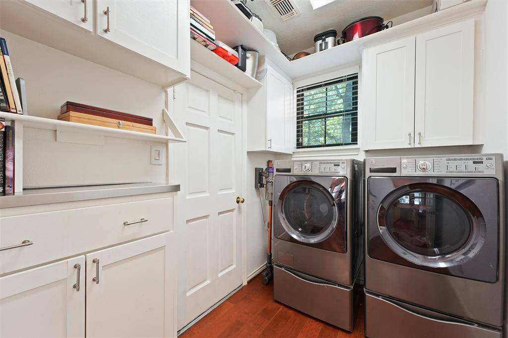 Laundry room with plenty of storage.
