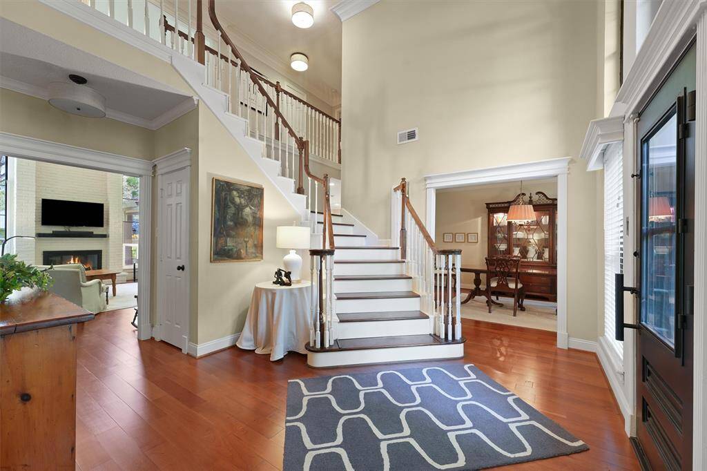 Grand 2 story entry and beautiful cherry hardwood floors throughout the first floor.