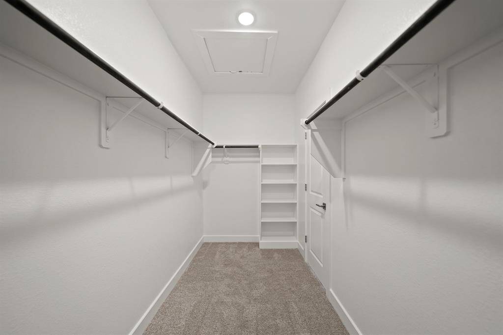 Spacious walk-in closet in the primary suite (*Photo not of actual home and used for illustration purposes only.)