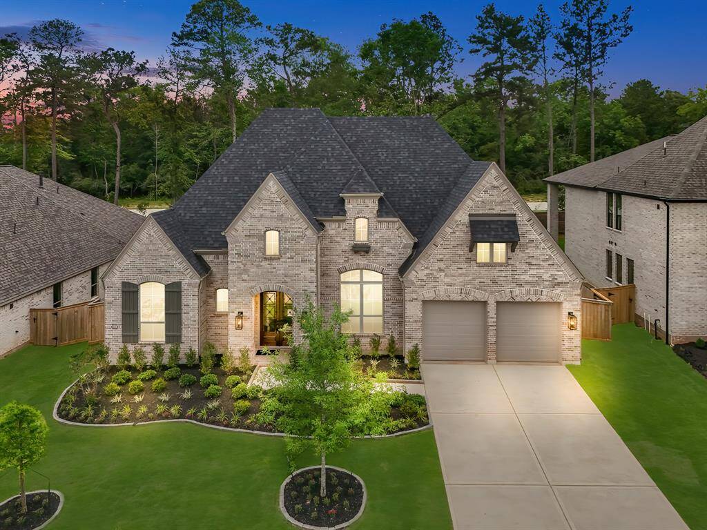 Welcome home to 214 Wooded Rill Court!