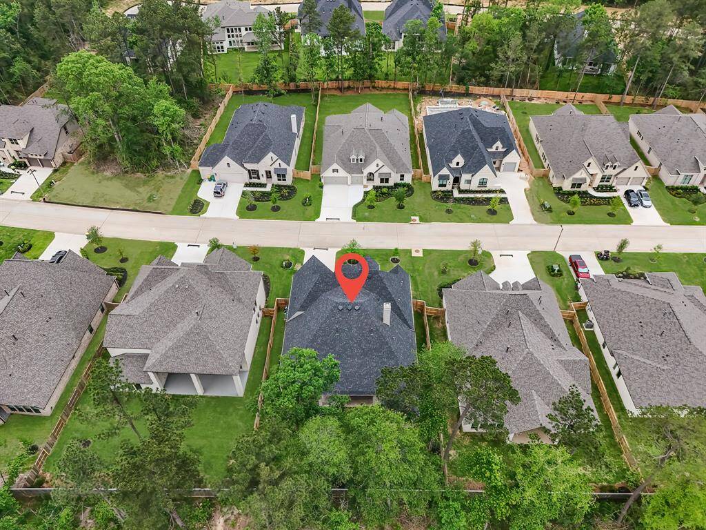 Aerial view of the property which includes no back neighbors and a private cul de sac lot!