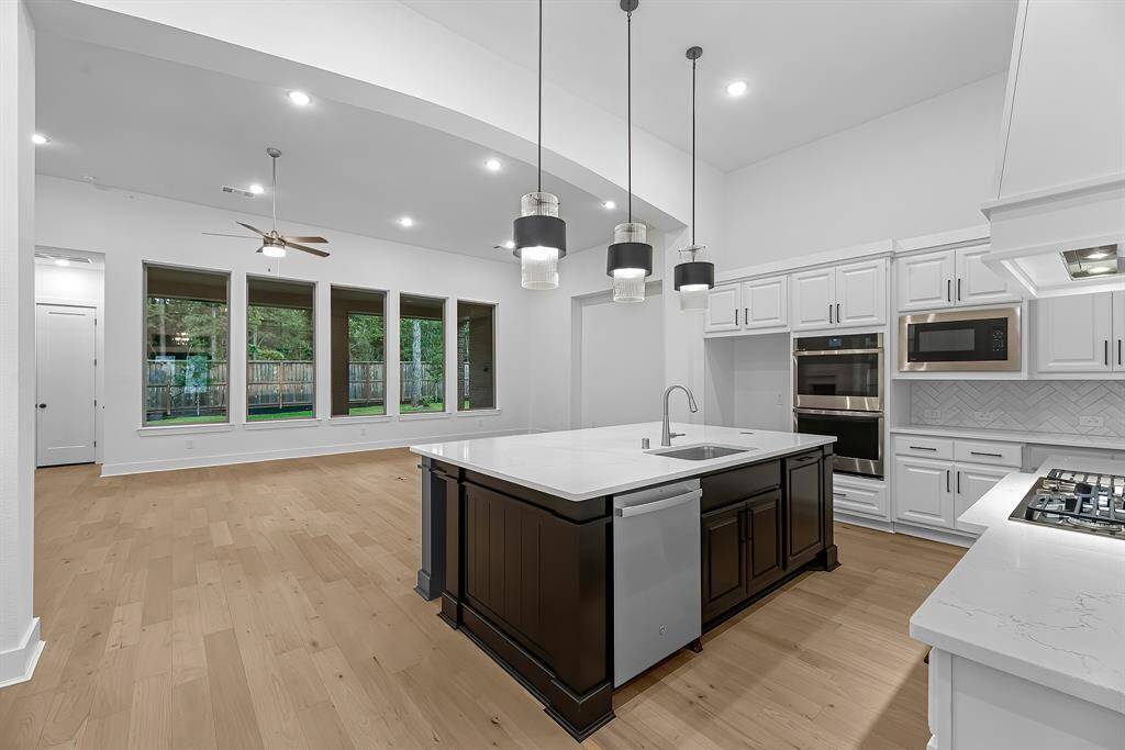 The kitchen provides an open concept to the family room where natural light abounds!