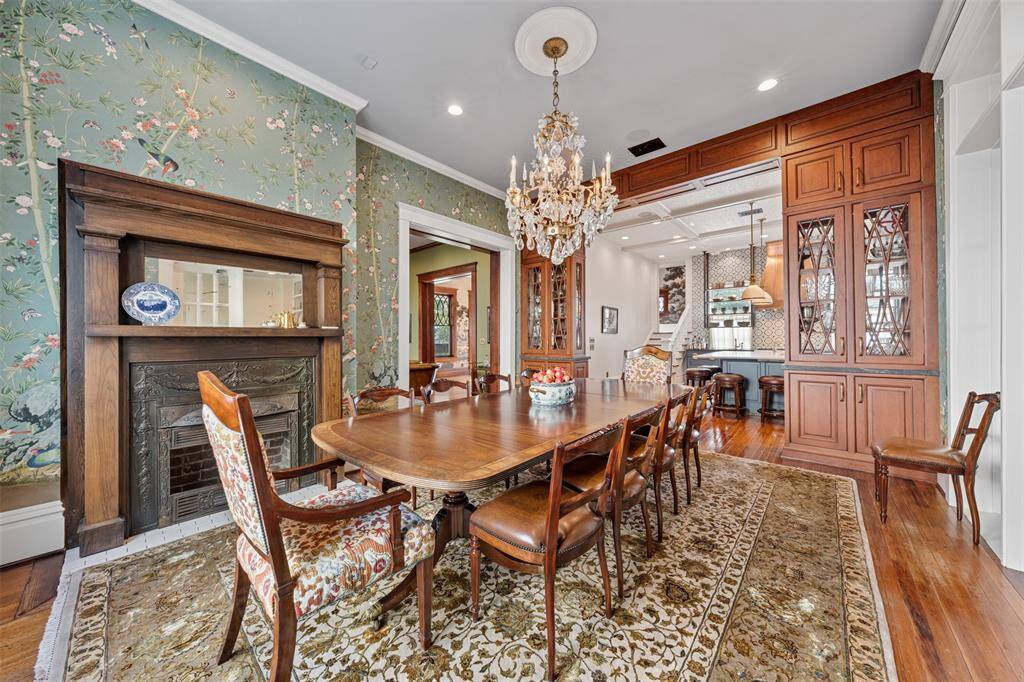Before central heating, the hearth was the heart of the home. This original fireplace once served both practical and social functions—and now stands as a charming architectural centerpiece.