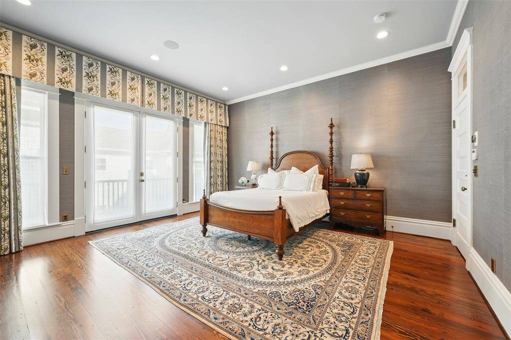 The primary suite is generous, private, and beautifully appointed. With direct access to a balcony and serene views, it offers the perfect balance of comfort and sophistication.
