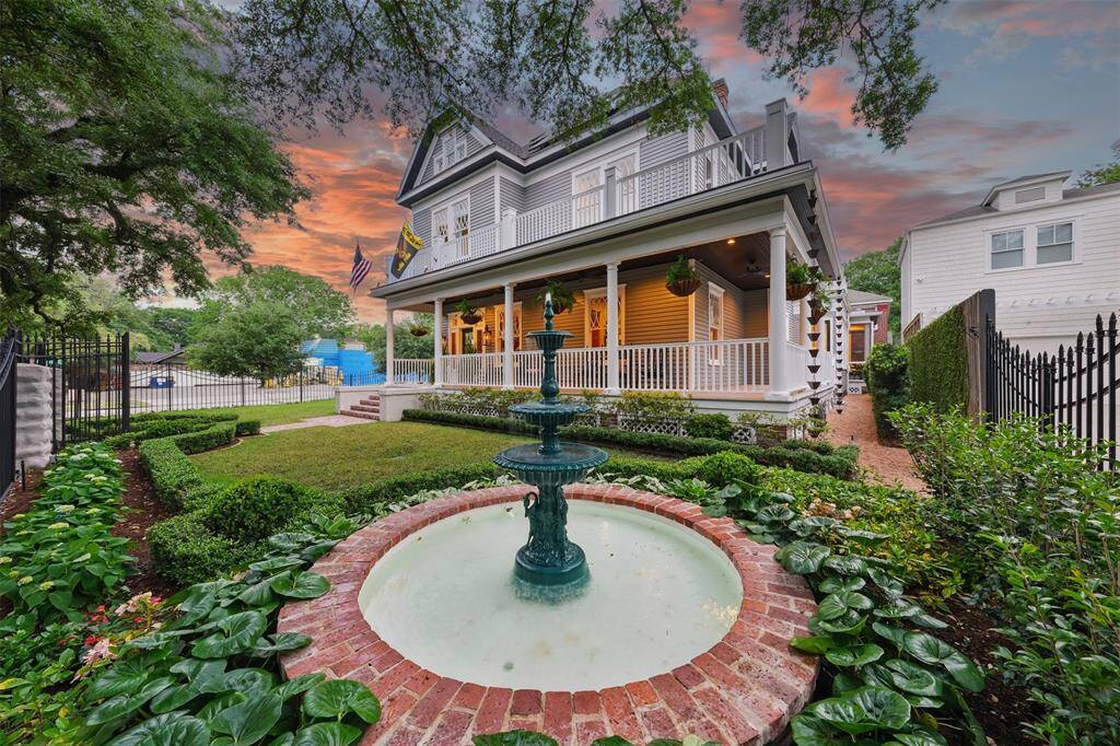 Few things exude Southern grace like a garden fountain. Nestled in the front yard, this feature enhances the home's warm welcome and complements its historic stature.