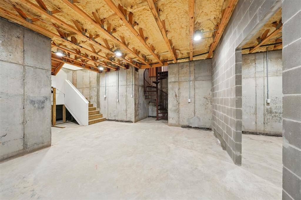 The basement was not part of the original structure. In a previous chapter, a portion of the home was used as a flower shop. During a two-month process, that area was excavated to create the basement you see today, followed by the construction of a new addition above it. This unique transformation adds valuable square footage and character to the home.