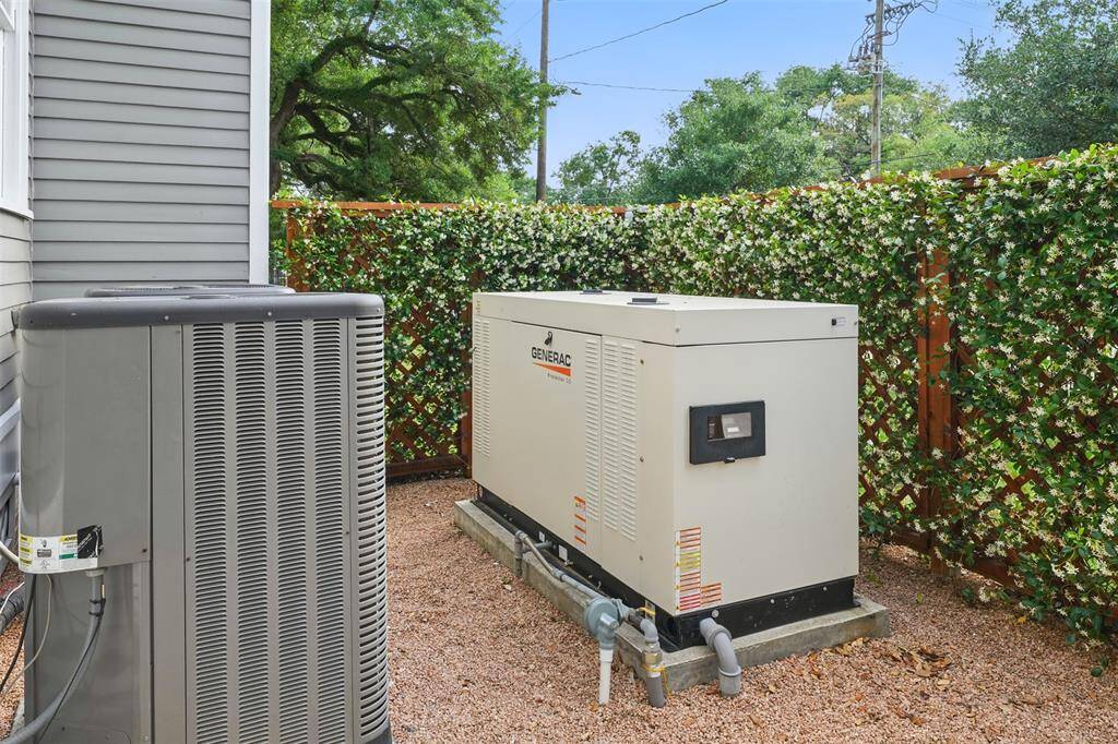 Designed for both resilience and sustainability, this home features a liquid-cooled 32kW whole-house generator—ensuring seamless comfort during outages—and rooftop solar panels that promote energy efficiency and long-term savings. Together, they offer exceptional performance, reliability, and peace of mind.