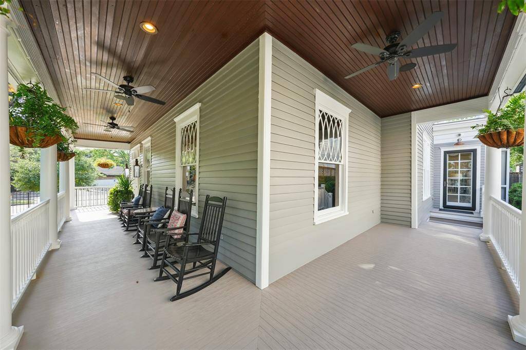 The idyllic wrap-around porch invites both connection and solitude. Perfect for morning coffee or evening cocktails, it’s designed for effortless relaxation and elevated entertaining.