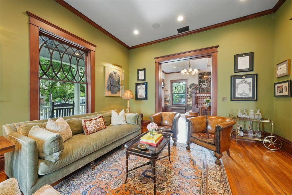 The parlor was once the heart of early 20th-century hospitality. In a home built for a family of stature, this space was central to both business and social gatherings — and continues to offer timeless elegance today.