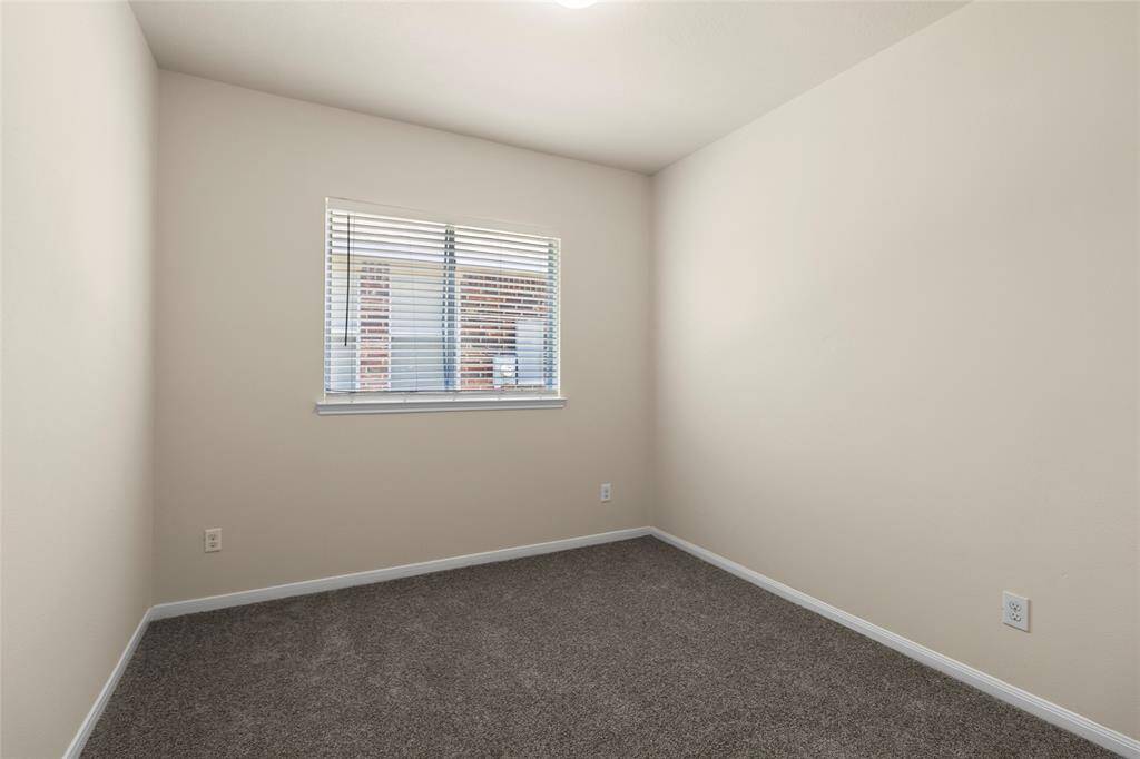 Whether you're setting up a nursery, a private home office, or a cozy guest room, this bedroom gives you the flexibility to make it your own. Natural light fills the space through a wide window, and the neutral tones make decorating simple and stress-free.