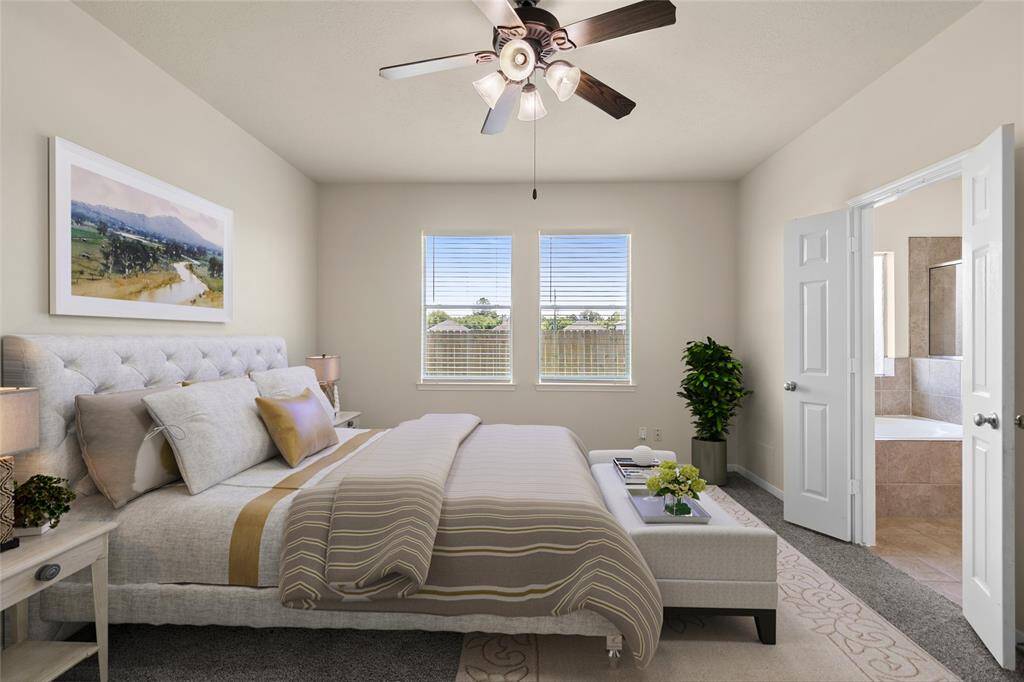 Enjoy a peaceful retreat in your primary bedroom, where soft carpet, twin windows, and abundant natural light create a bright yet cozy atmosphere. With direct access to the en-suite bath, it’s your own private space designed for comfort and ease.