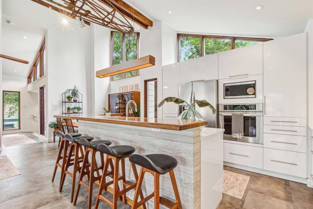 Lots of storage in this modern, elegant kitchen with fully custom soft close cabinetry. LG steel appliances and lots of natural light.