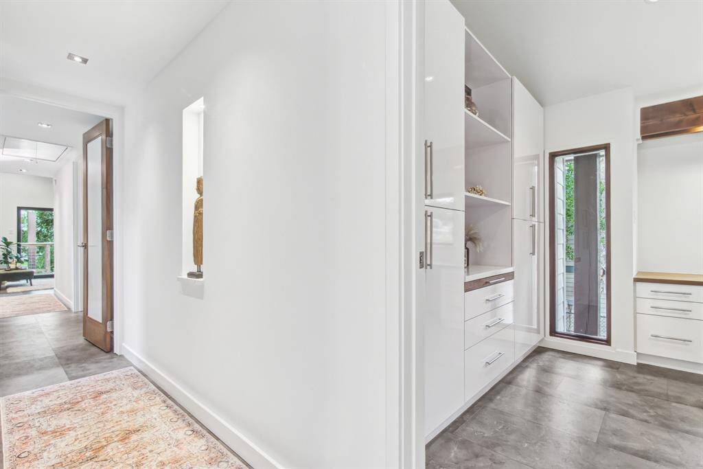 Entryway to bedrooms. Notice the custom built in cabinetry. All soft close.