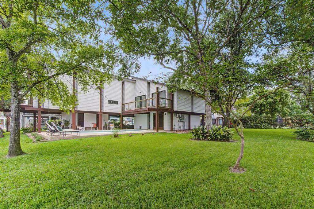 Situated on a double lot. this fenced in home has so much additional yard space. Imagine adding a tiny home for a guest or in-law suite.