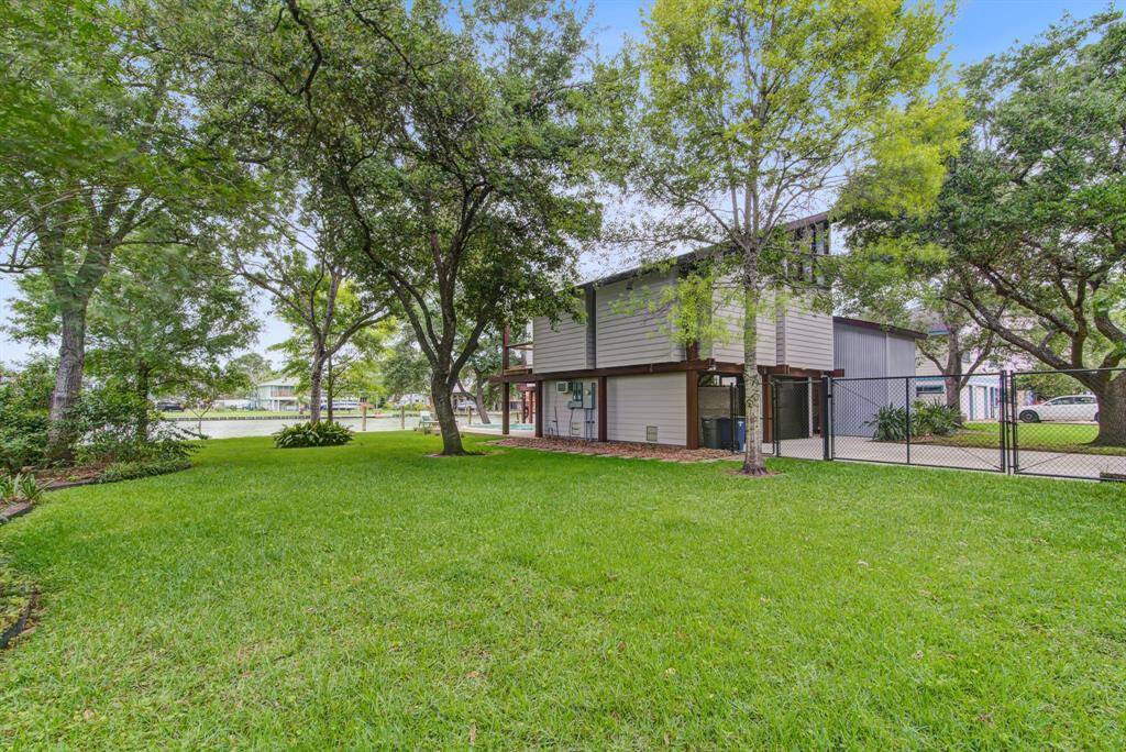 Water view from this huge over sized yard space. Lots of potential, add a 'tiny house' for a quest suite or enjoy the extra space for kids and dogs to play.