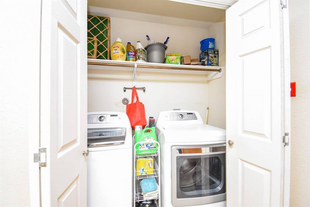 Utility room tucked away in the kitchen area