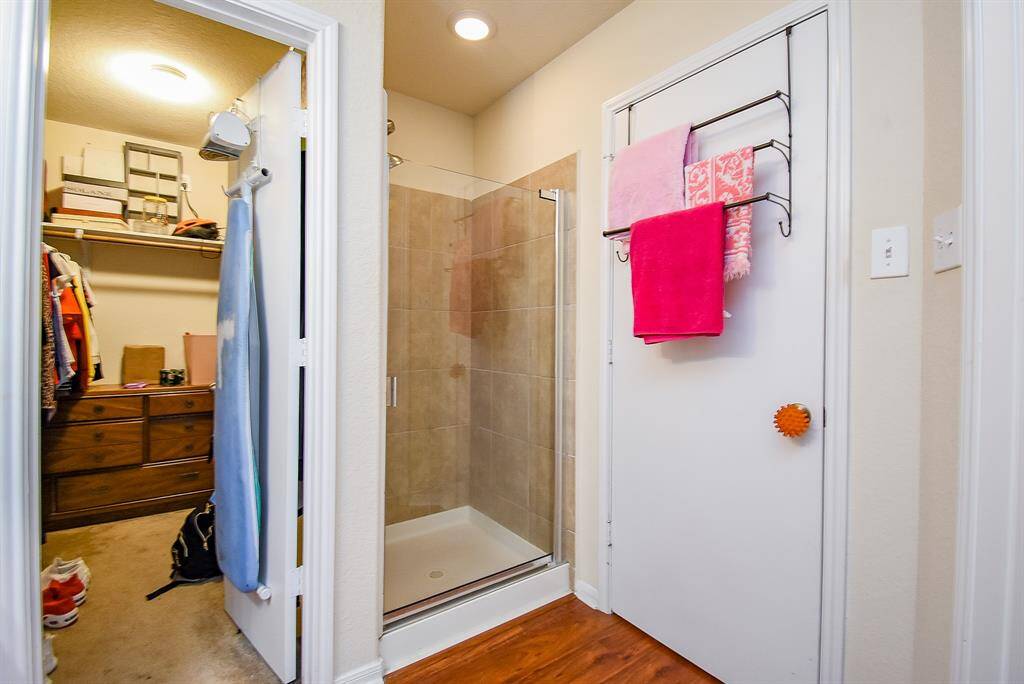 Walk-in shower and closet entry