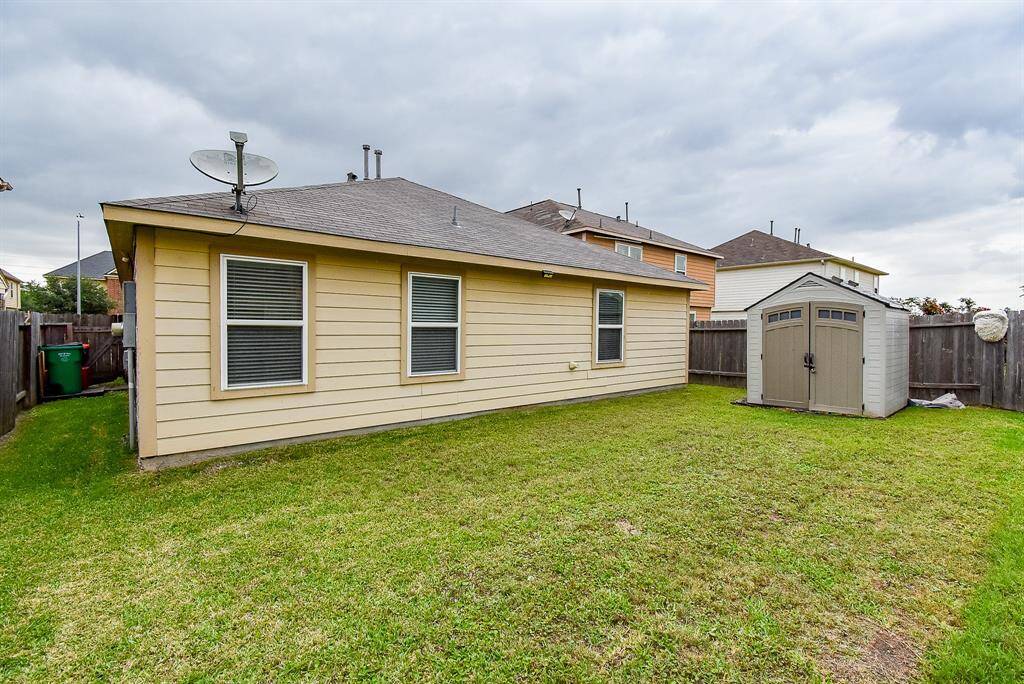 Back yard with extra storage (included!)