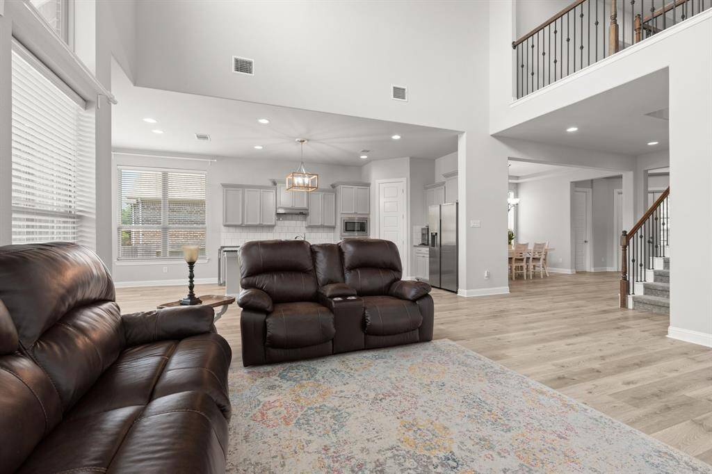 large living area with high ceilings