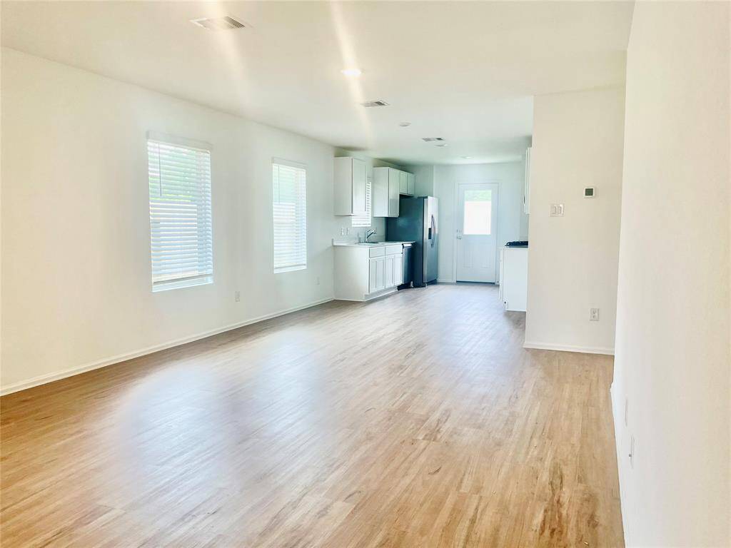 View from front door of Living and kitchen.