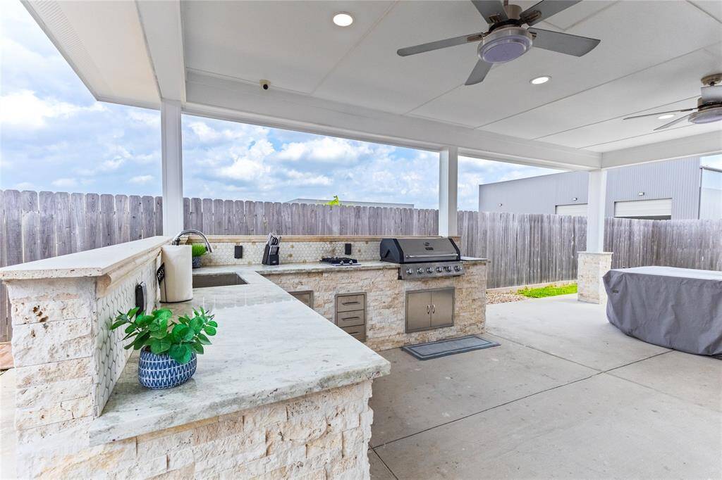 Expansive outdoor kitchen counter space for effortless entertaining.