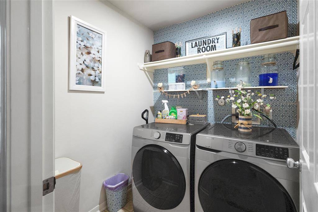 Spacious and well-organized laundry room.