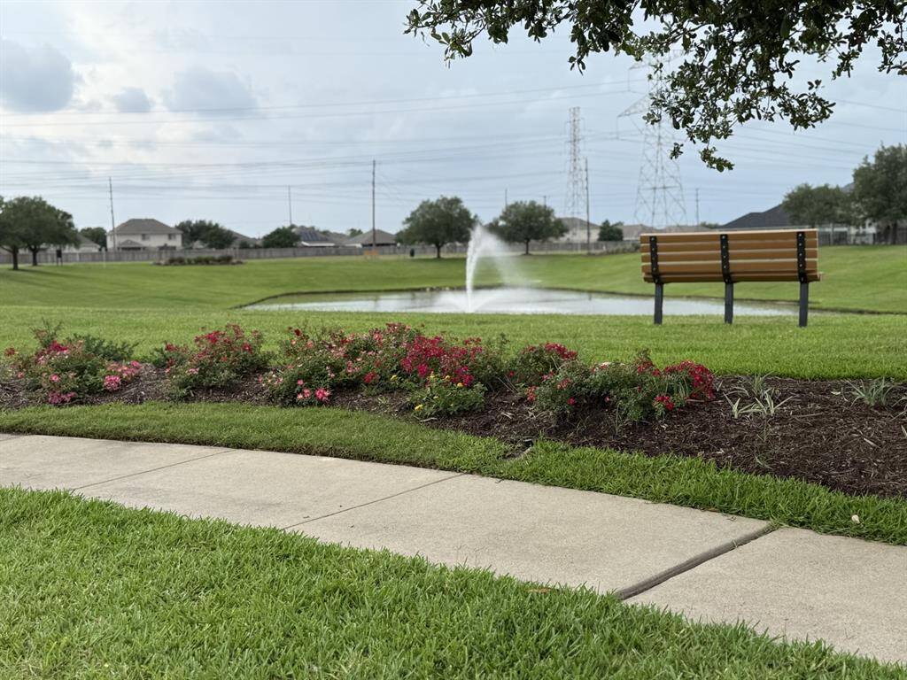 Enjoy serene strolls by the neighborhood pond and scenic walking trail.