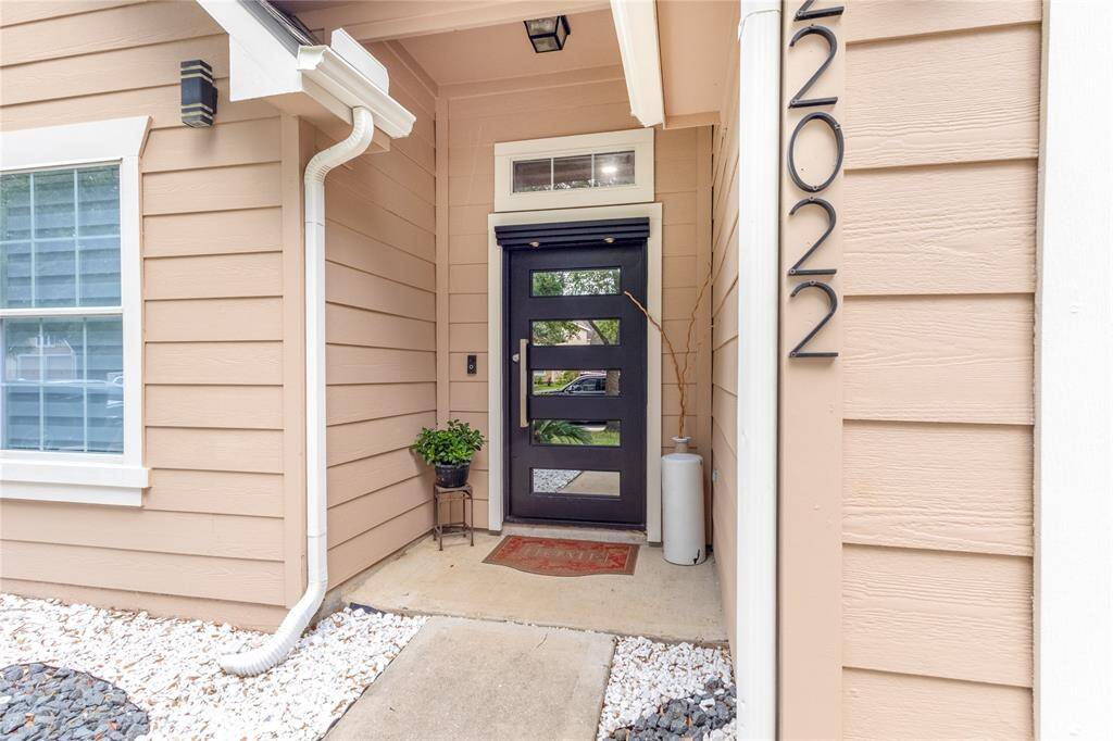 Inviting and stylish entrance with modern door design.