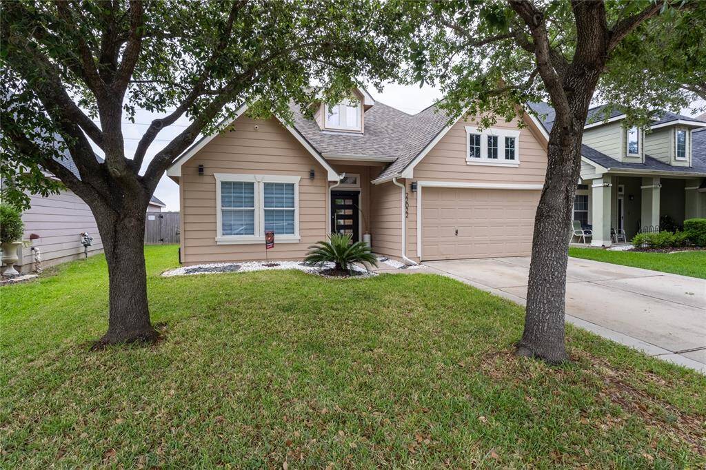Charming and inviting landscaping enhances this home's curb appeal, offering a serene and welcoming atmosphere.