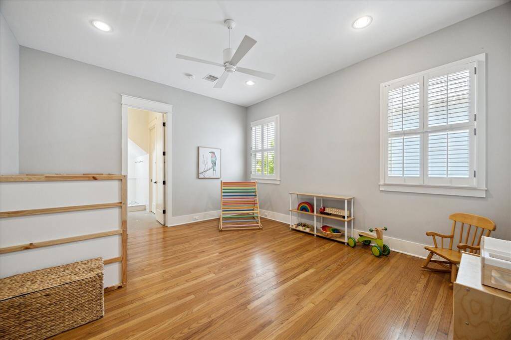 One of two secondary bedrooms - both have spacious walk-in closets and ensuites